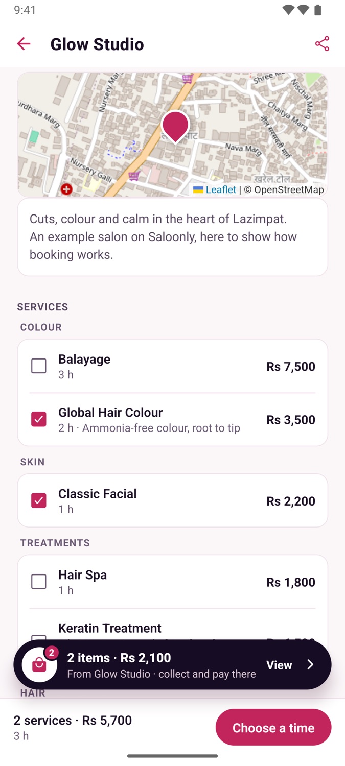 A salon page on Saloonly with a map, description and services with prices